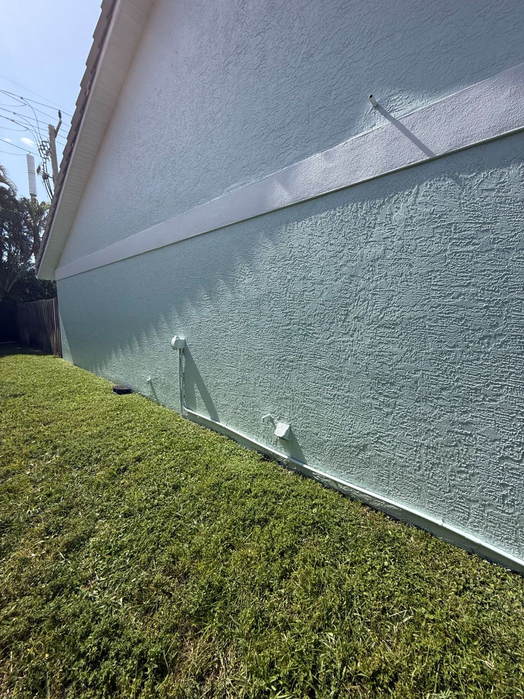 Freshly painted textured stucco wall