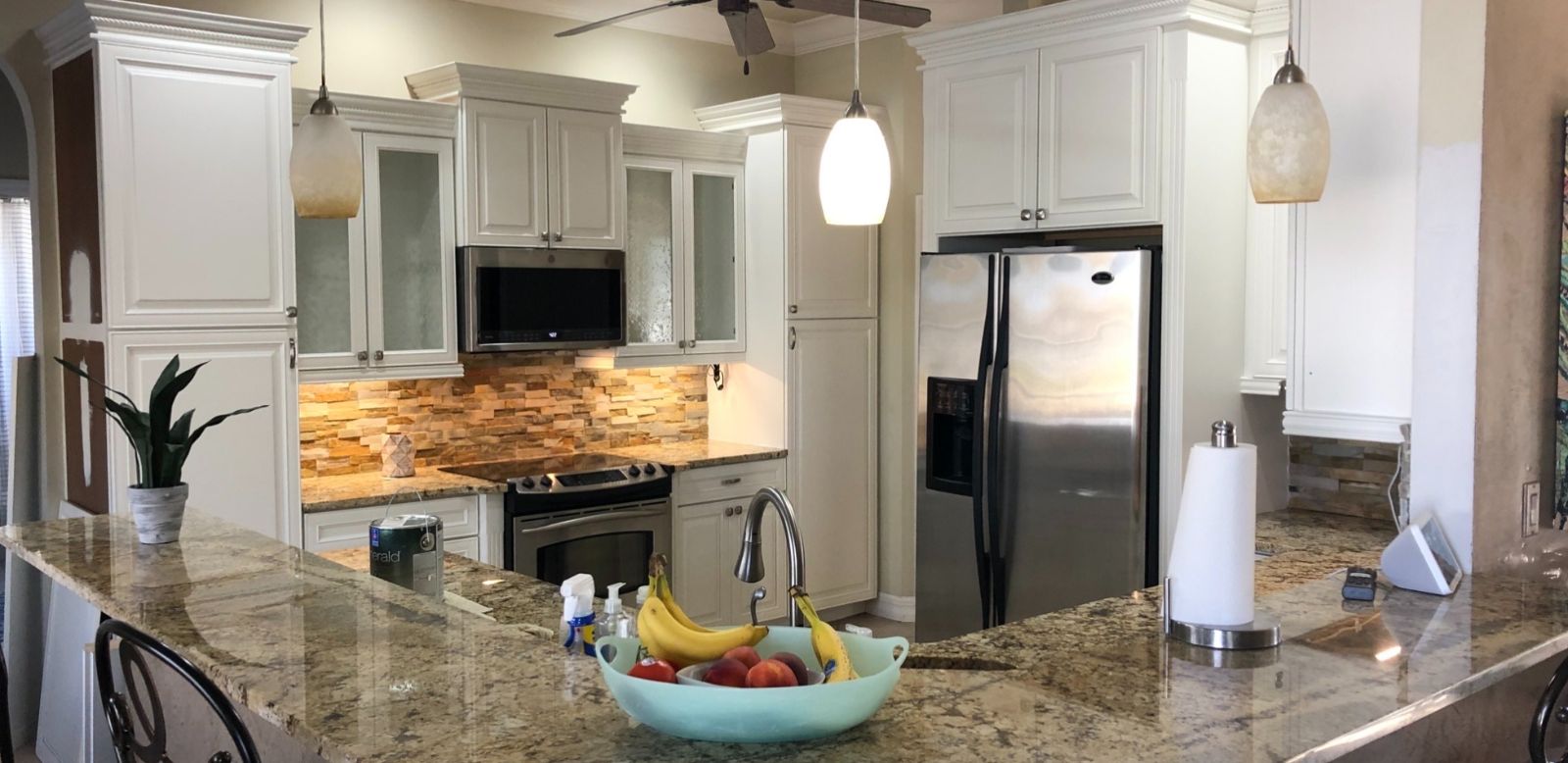 Kitchen after: cabinets painted white